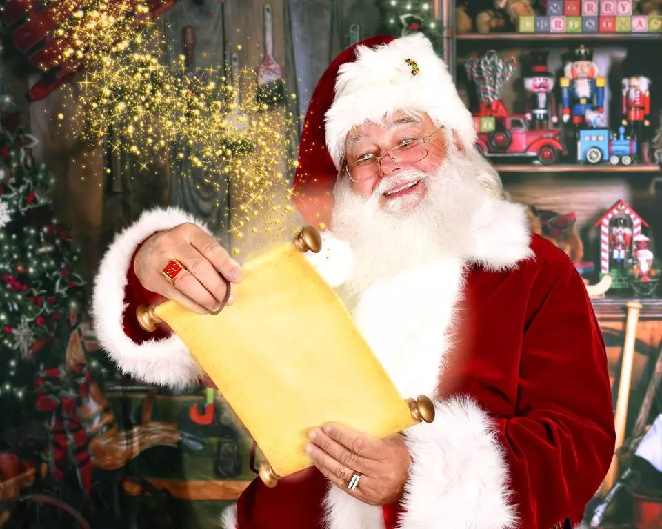 Santa Claus Going Through a Scroll of Names